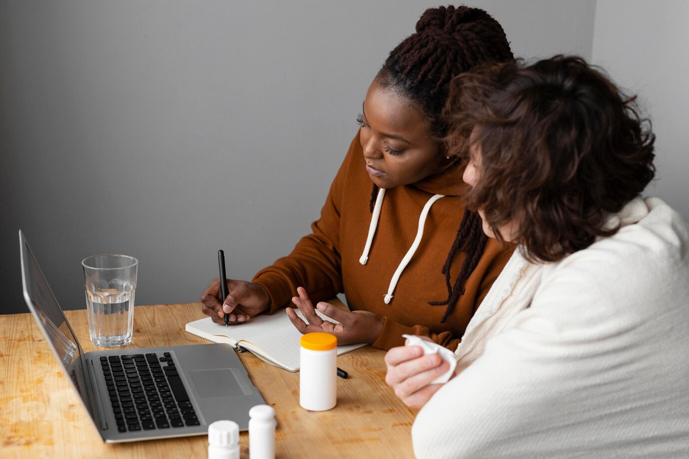young-sick-man-friend-having-video-call-with-doctor_23-2148944900